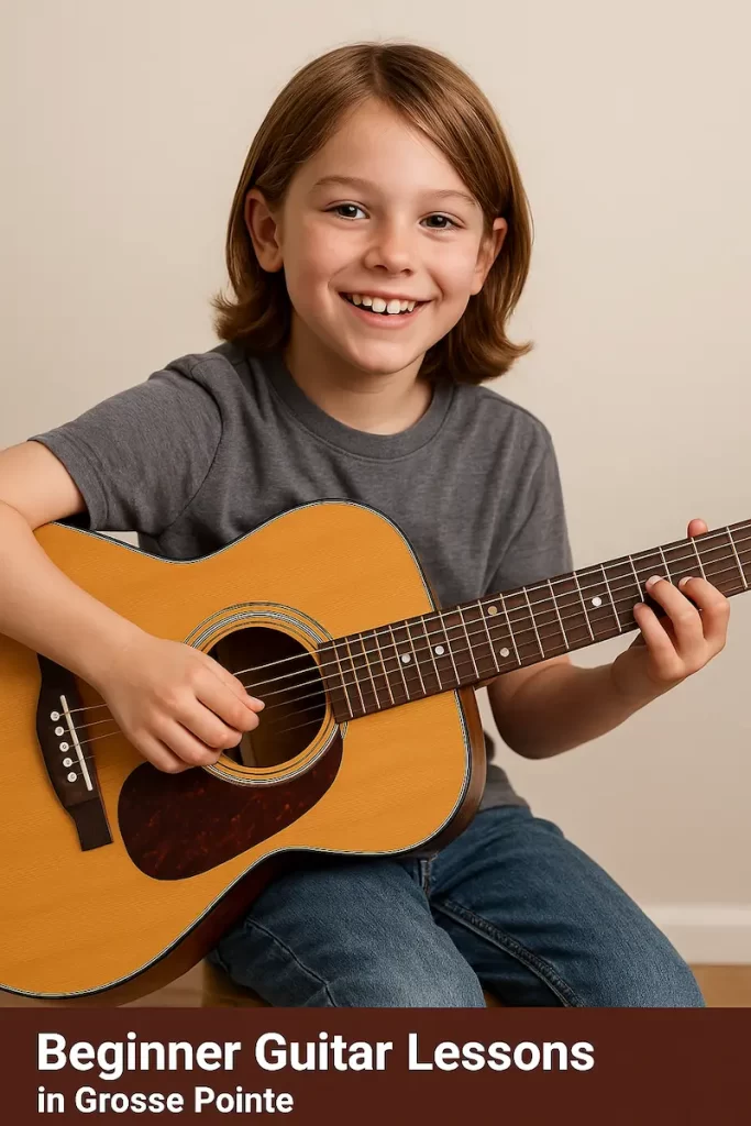 Young Guitar Player learning and playing guitar at Grosse pointe music Academy